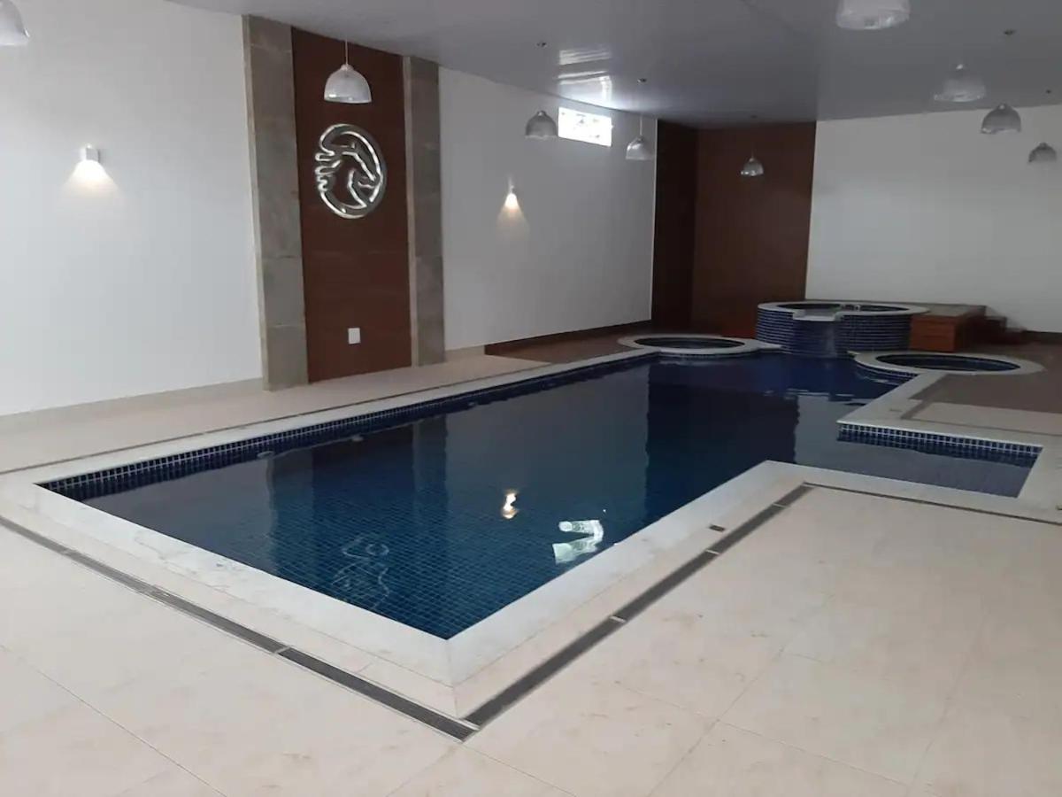 Апартаменты Agradavel Flat - Cavalinho Branco - Агуас-ди-Линдоя Экстерьер фото